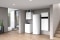 Das Bild zeigt verschiedene Viessmann Produkte als System in einem modernen Wohnhaus: ein zentrales Vitovent 300-W Lüftungsgerät, eine Vitocal 300-G Wärmepumpe, einen Vitocell Warmwasserspeicher und einen Vitocharge VX3 Stromspeicher.